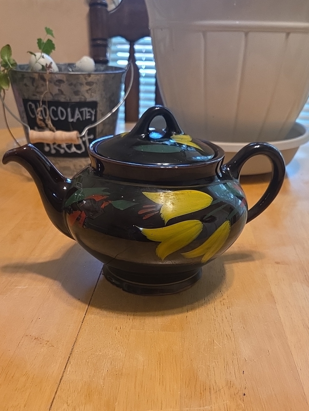 Hand-Painted Black Ceramic Teapot with Yellow Floral Design